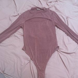 Shimmery pink bodysuit with cutout on chest